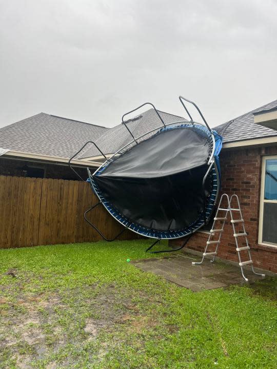 A trampoline was pushed against a home in Addis during the storm on Wednesday, April 10.
