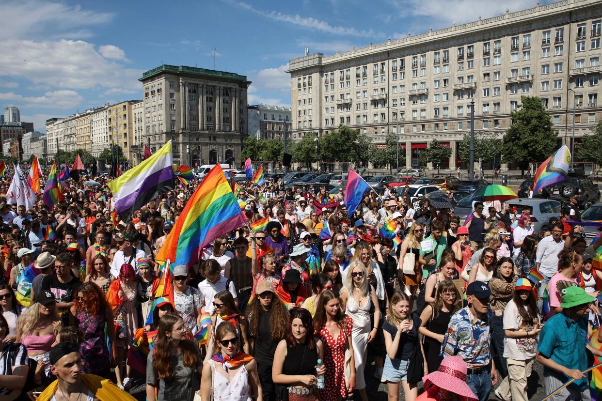 People take part in the 'Warsaw and Kyiv Pride' marching for freedom in Warsaw.