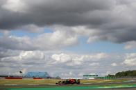 <p>Red Bull's Dutch driver Max Verstappen steers his car during the qualifying session for the Formula One British Grand Prix at the Silverstone motor racing circuit in Silverstone, central England on August 1, 2020.</p>