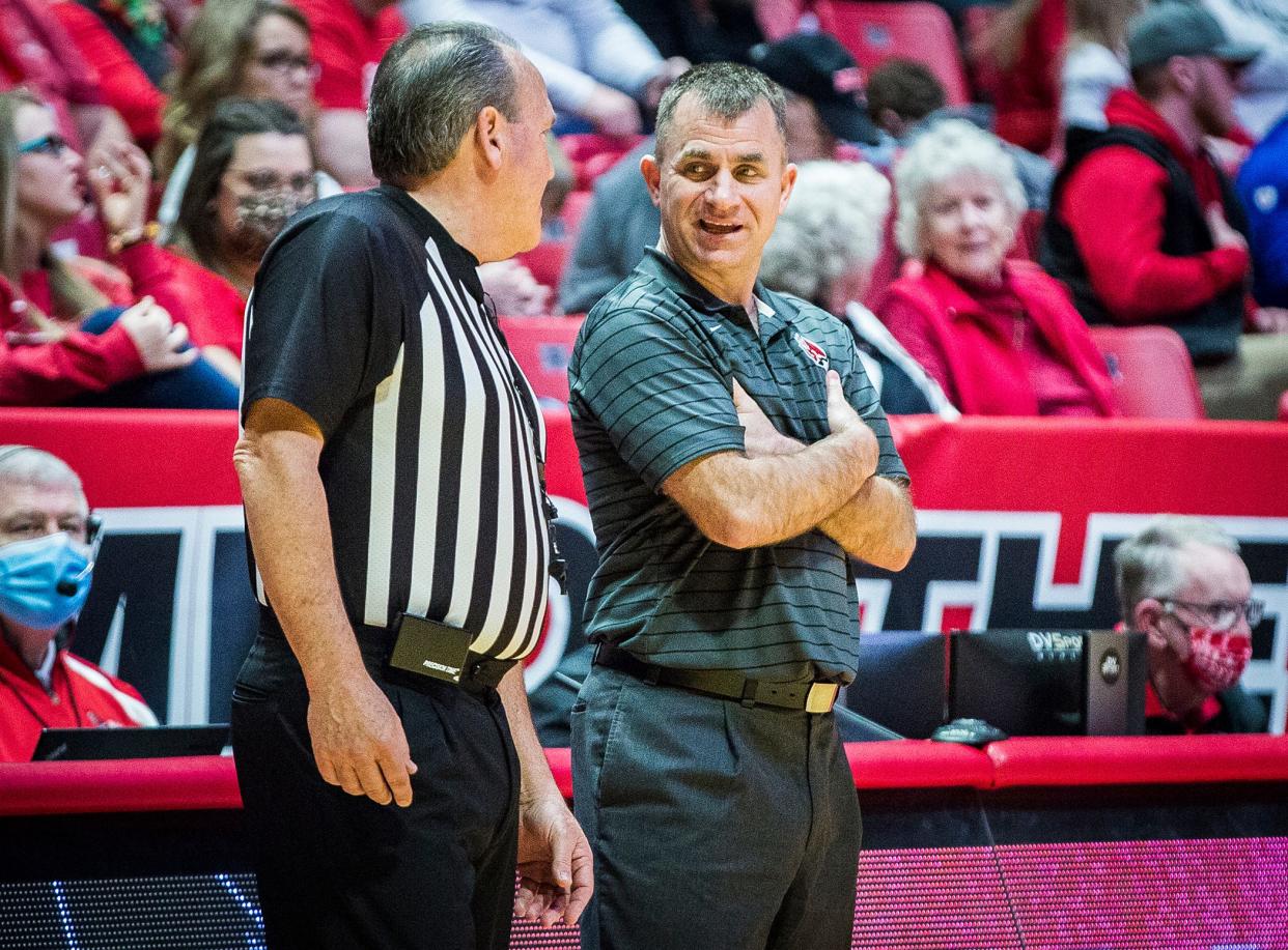 James Whitford talks to an official when he was the Ball State head coach in 2022.