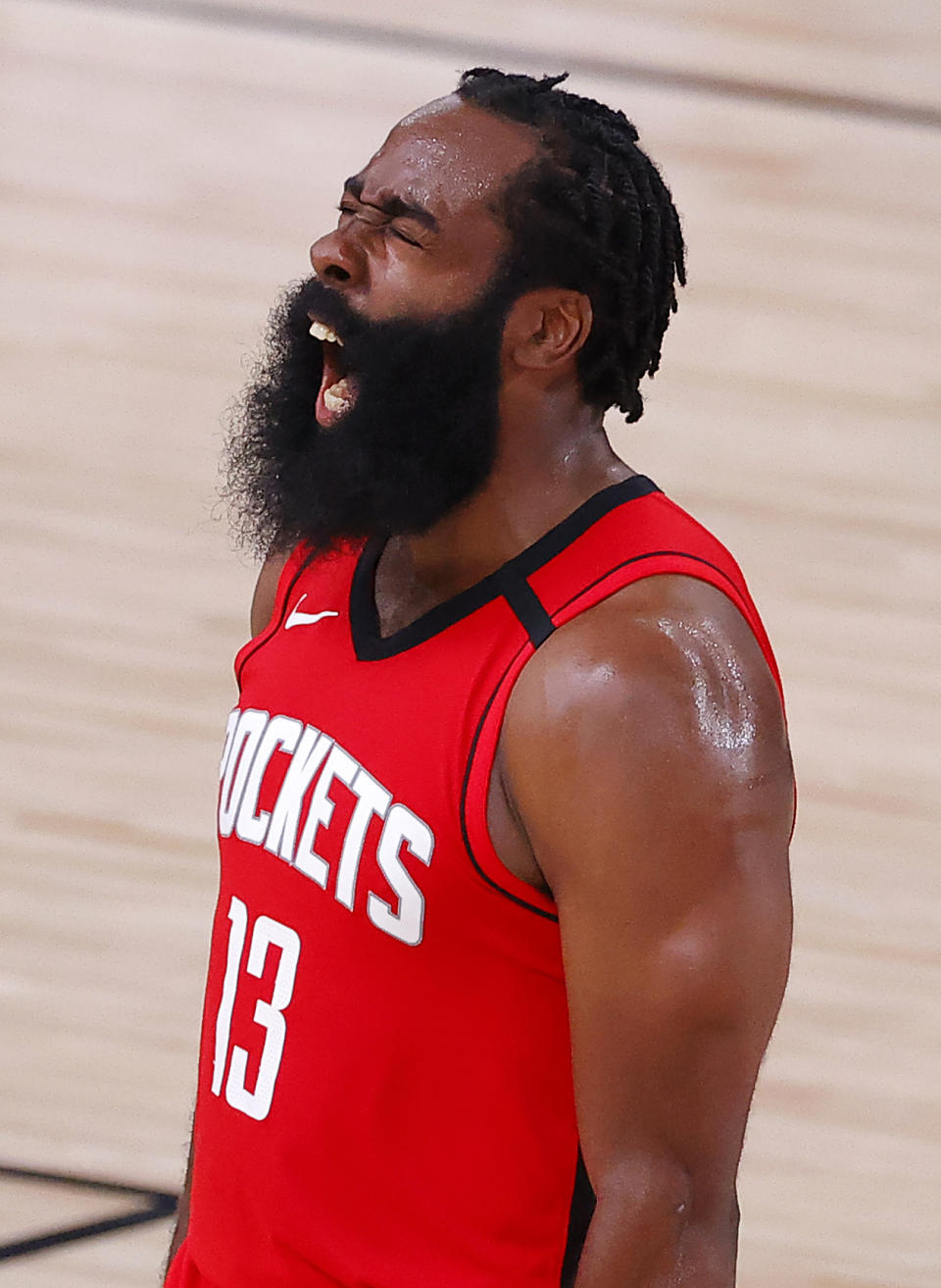Houston Rockets' James Harden reacts after his three-point basket during the fourth quarter of Game 2 of an NBA basketball first-round playoff series against the Oklahoma City Thunder, Thursday, Aug. 20, 2020, in Lake Buena Vista, Fla. (Kevin C. Cox/Pool Photo via AP)