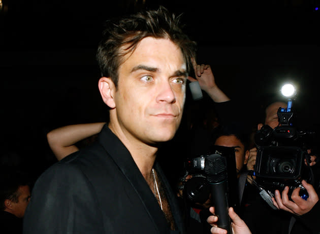 <p>Robbie Williams will be the subject of a new film biopic</p> (Getty)