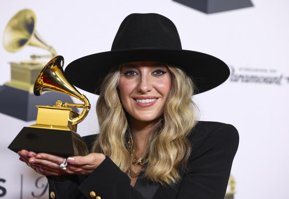 Lainey Wilson poses with the Best Country Album award during the 66th Annual Grammy Awards in Los Angeles, California, U.S., February 4, 2024. REUTERS/David Swanson