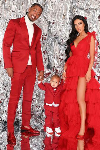 <p>Chris Martin</p> Nick Cannon and Bre Tiesi pose with son Legendary.