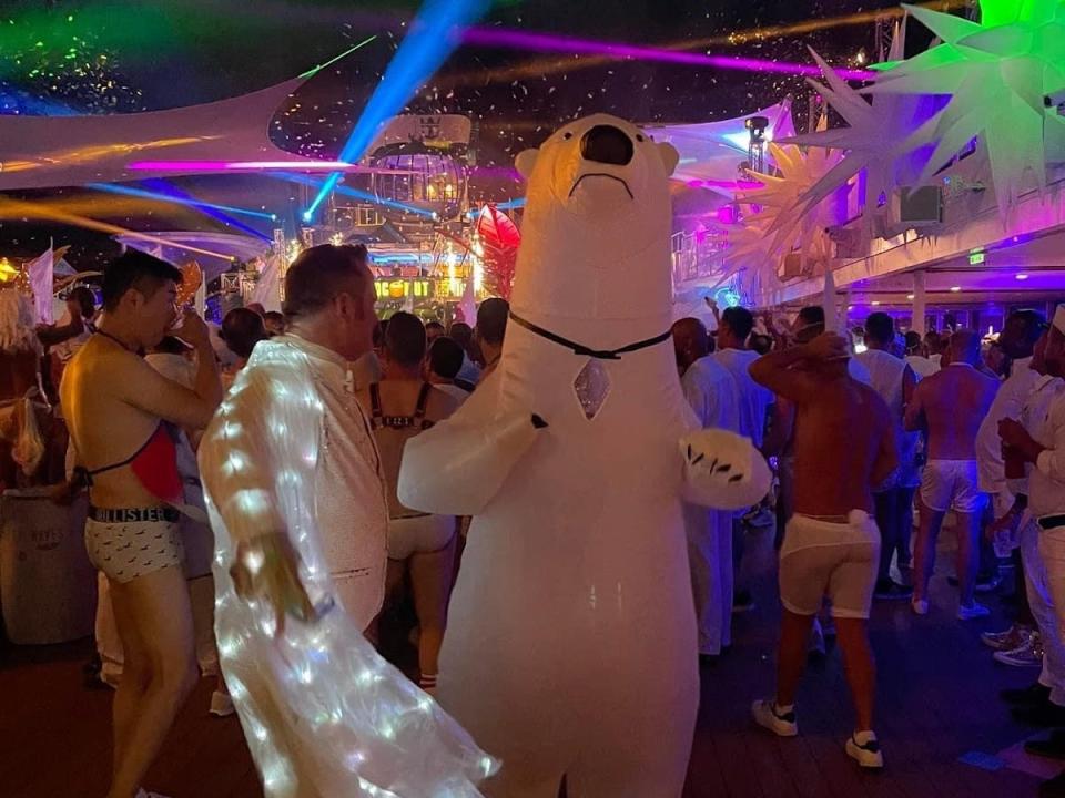 someone in a light up outfit and polar bears