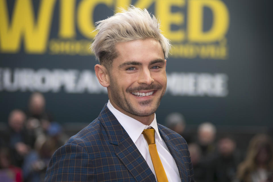 Actor Zac Efron poses for photographers upon arrival at the 'Extremely Wicked, Shockingly Evil And Vile' premiere in London.