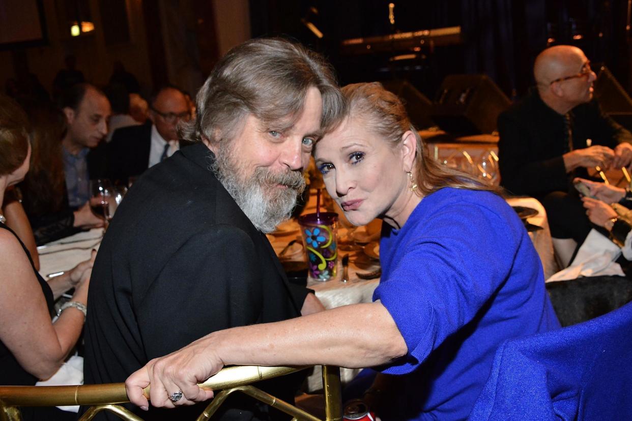 <p>Mark Hamill, left, paid tribute to Carrie Fisher, right</p> (Araya Diaz/Getty Images)