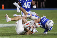Clemson's Cade Klubnik (2) is hit by Duke's Cam Dillon (35), who was penalized for targeting on the play, during the second half of an NCAA college football game in Durham, N.C., Monday, Sept. 4, 2023. (AP Photo/Ben McKeown)