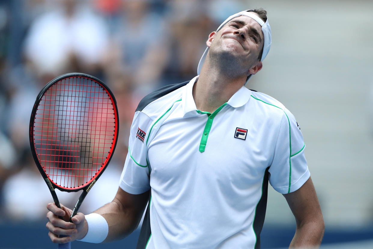 John Isner, the last American man left competing at the U.S. Open, was defeated by Juan Martín del Potro on Tuesday. (Photo by Elsa/Getty Images)