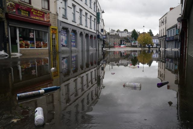 A view of debris and flood water in Sugar Island as the clear up begins in Newry Town, Co Down, which has been swamped by floodwater as the city’s canal burst its banks amid heavy rainfall. 