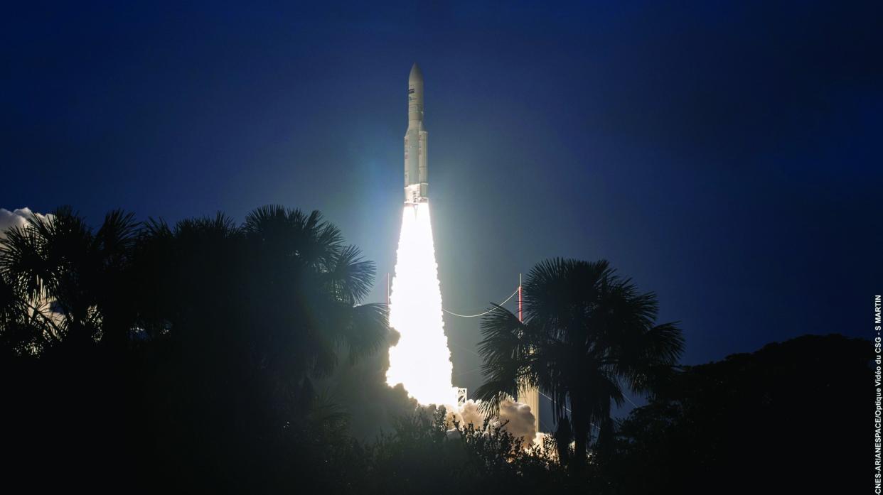  an arianespace ariane 5 rocket launches into a dark sky in july 2015. 