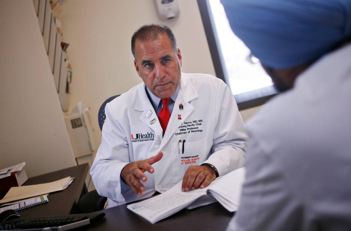 Dr. Ralph Sacco, left, reviews a patient’s case with vascular neurology trainee Dr. Hartej Sethi, right, at the University of Miami. Dr. Sacco was the first neurologist to head the American Heart Association.