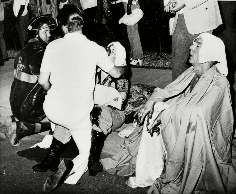 <div class="inline-image__caption"><p>Firemen give first aid to survivors at the UpStairs Lounge.</p></div> <div class="inline-image__credit">G E Arnold/AP/REX/Shutterstock</div>