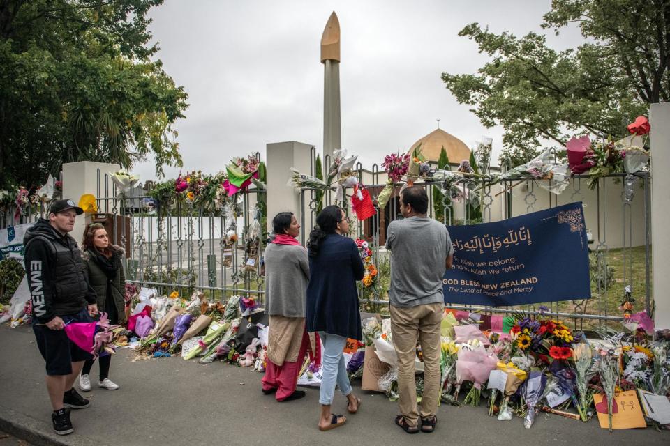 People gather outside Al Noor mosque after it was officially reopened following last week's attack (Getty Images)