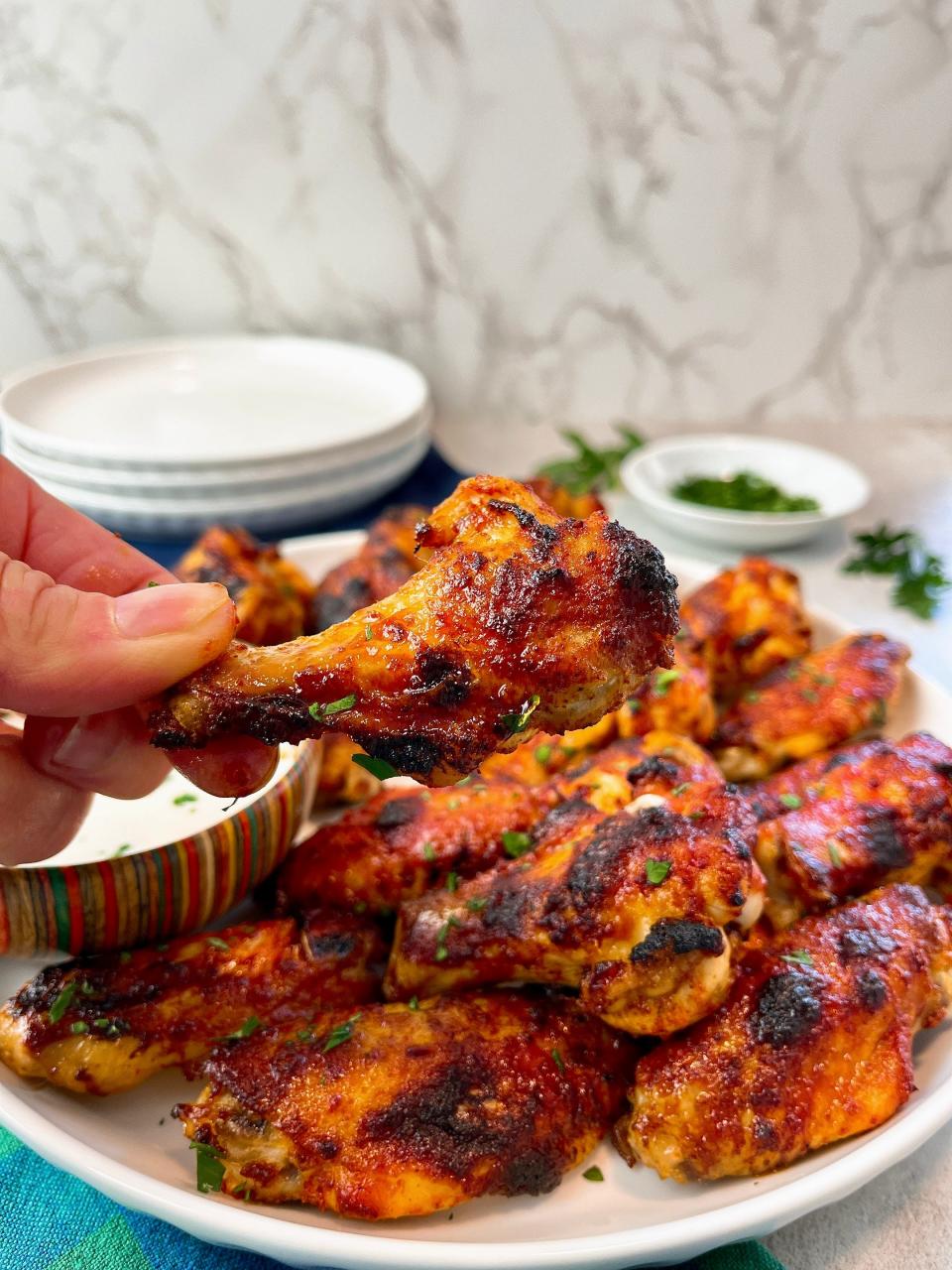 Baked chicken wings are a healthier take on a classic.