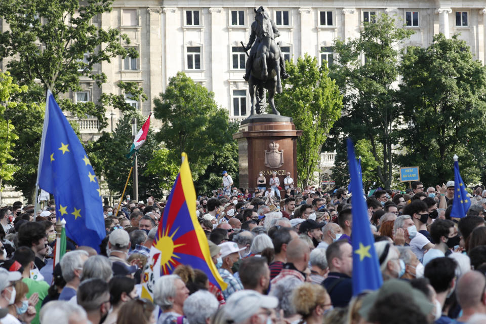 Protesters gather in downtown Budapest, Hungary, Saturday, June 5, 2021. Thousands of people gathered opposing the Hungarian government's plan of building a campus for China's Fudan University in Budapest. (AP Photo/Laszlo Balogh)