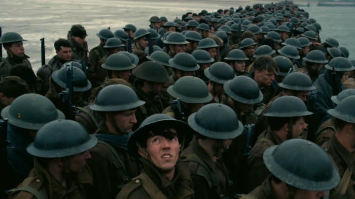 A group of soldiers stand in a crowded boat in Dunkirk.