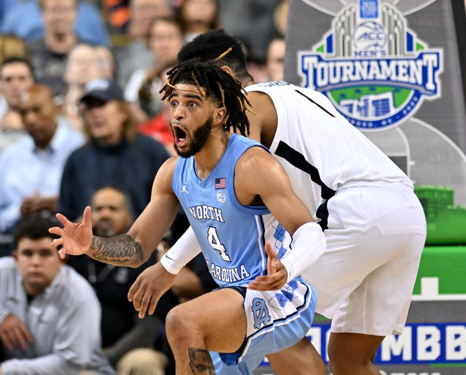 North Carolina's R.J. Davis reacts after being called for a foul against Virginia.