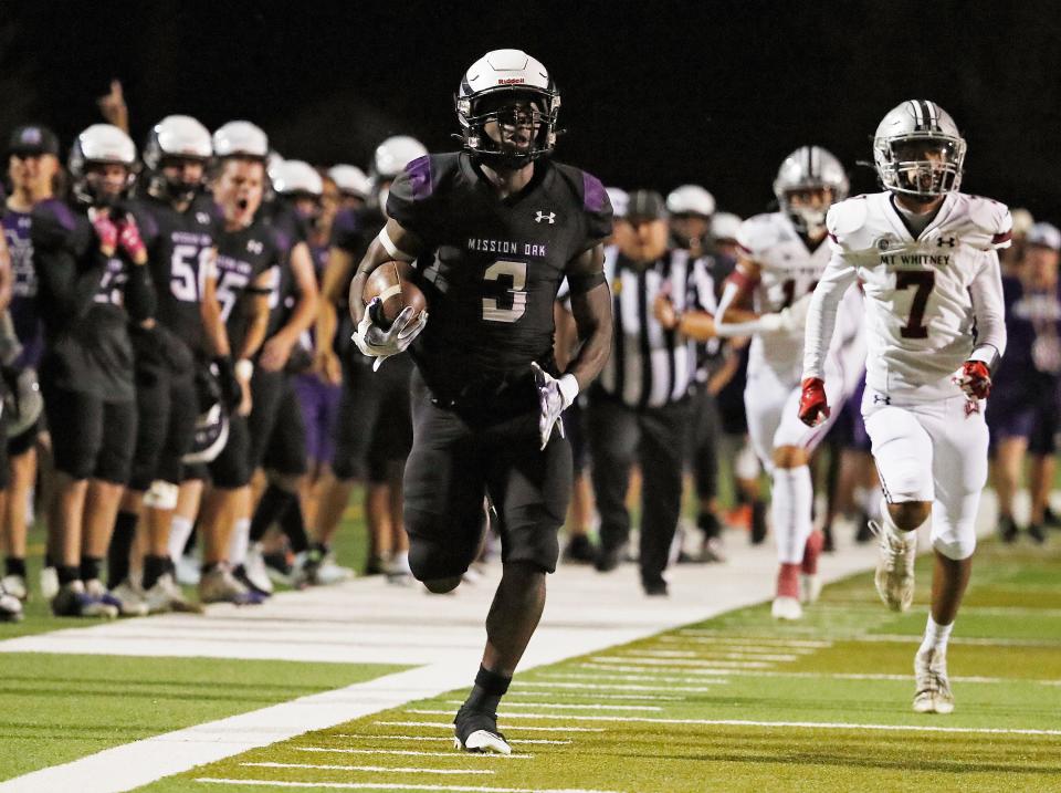 Mission Oak's Kenny Jackson runs in for a touchdown against Mount Whitey during their football game at Bob Mathias Stadium in Tulare, Calif., Friday, Sept. 8, 2023.