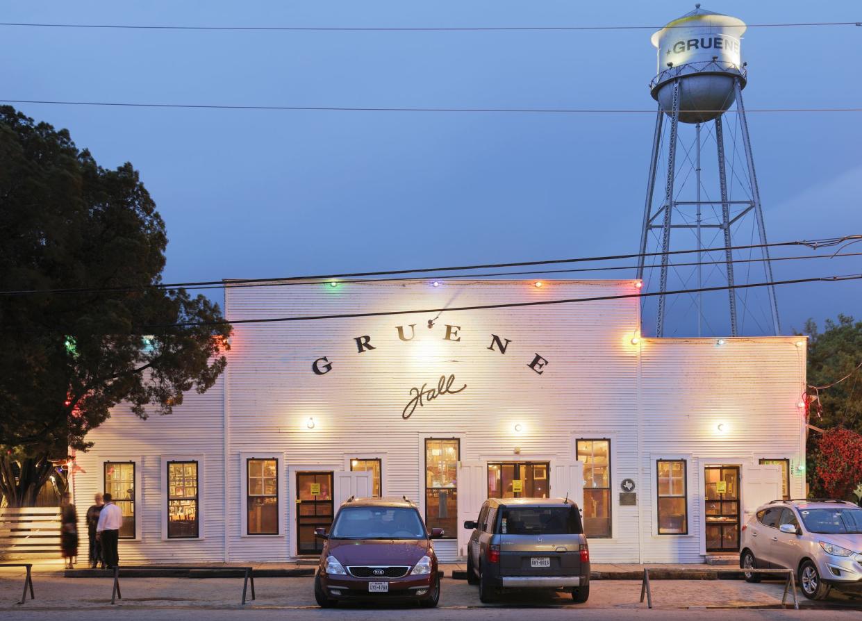 New Braunfels, Texas, USA - April 6, 2019: Night time view of the Gruene Hall (c. 1878) - the oldest continually run dance hall in Texas. Gruene Hall has become a tourist attraction as well as a major music venue.