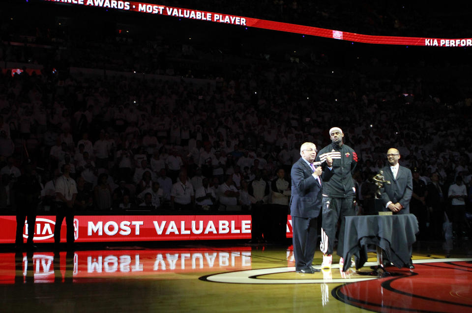 MIAMI, FL - MAY 13: Forward Lebron James #6 (C) of the Miami Heat receives the Most Valuable Player Trophy from Commissioner of the NBA David Stern (L) prior to playing against the Indiana Pacers in Game One of the Eastern Conference Semifinals in the 2012 NBA Playoffs on May 13, 2012 at the American Airines Arena in Miami, Florida. (Photo by Marc Serota/Getty Images)