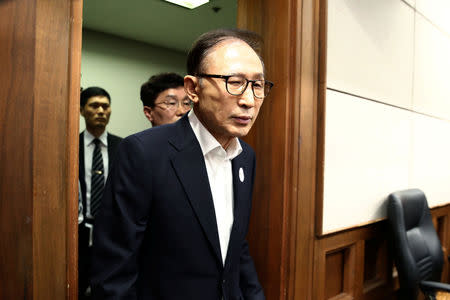 Former South Korean President Lee Myung-Bak appears for his first trial at the Seoul Central District Court on May 23, 2018 in Seoul, South Korea. Chung Sung-Jun/Pool via Reuters