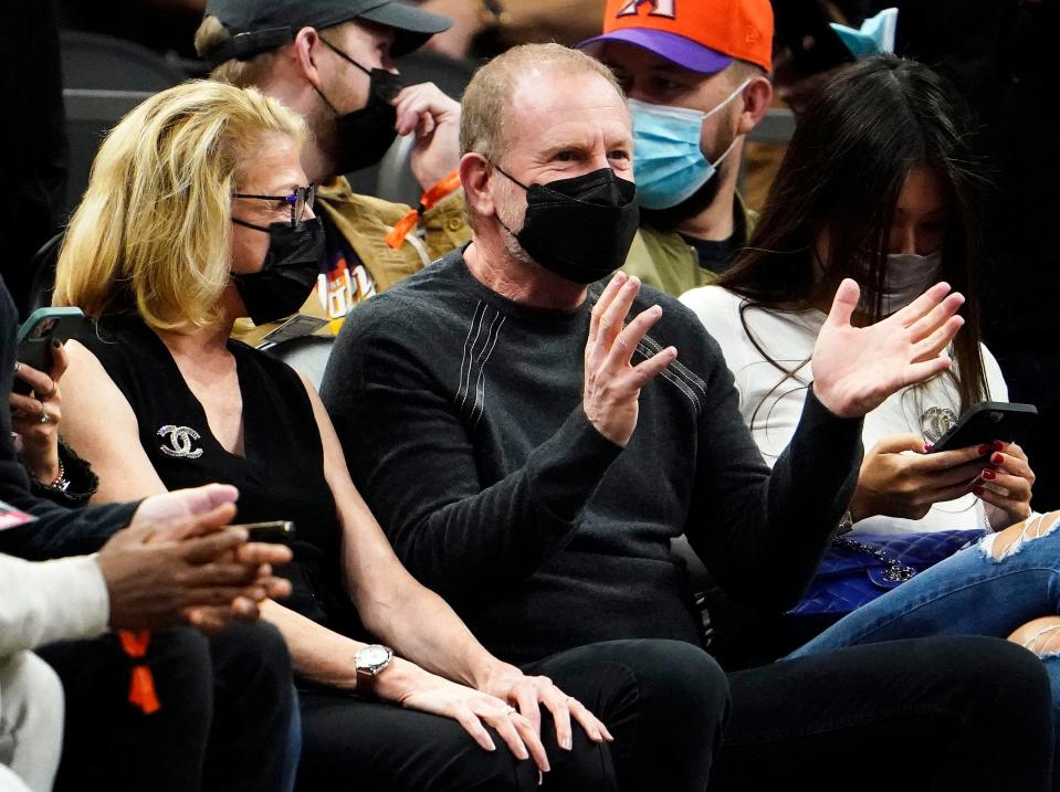 Dec 19, 2021; Phoenix, Arizona, USA; Phoenix Suns owner Robert Sarver watches the game from court side against the Charlotte Hornets at Footprint Center.