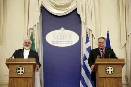 Iranian Foreign Minister Mohammad Javad Zarif (L) and his Greek counterpart Nikos Kotzias attend a joint news conference in Athens May 28, 2015. Zarif said on Thursday he hoped Tehran and world powers would reach a final nuclear deal "within a reasonable period of time" but this would be hard if the other side stuck to what he called excessive demands. REUTERS/Alkis Konstantinidis