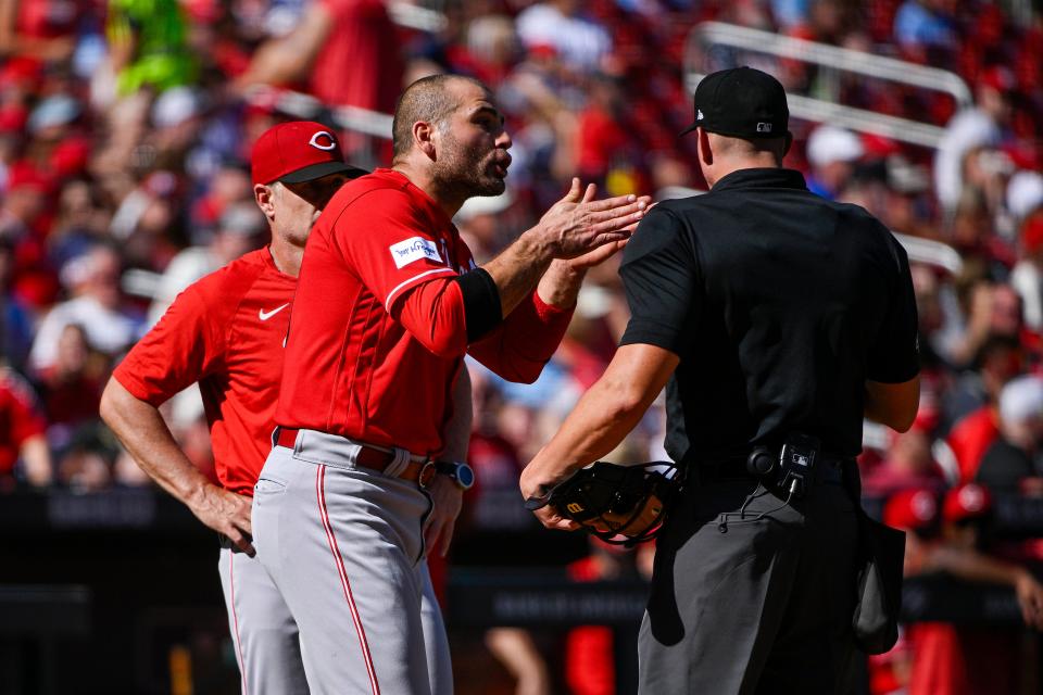 Oct 1, 2023; St. Louis, Missouri, USA;  Cincinnati Reds first baseman Joey Votto (19) argues with umpire Shane Livensparger (43) after he was ejected from the game after the first inning against the St. Louis Cardinals at Busch Stadium.