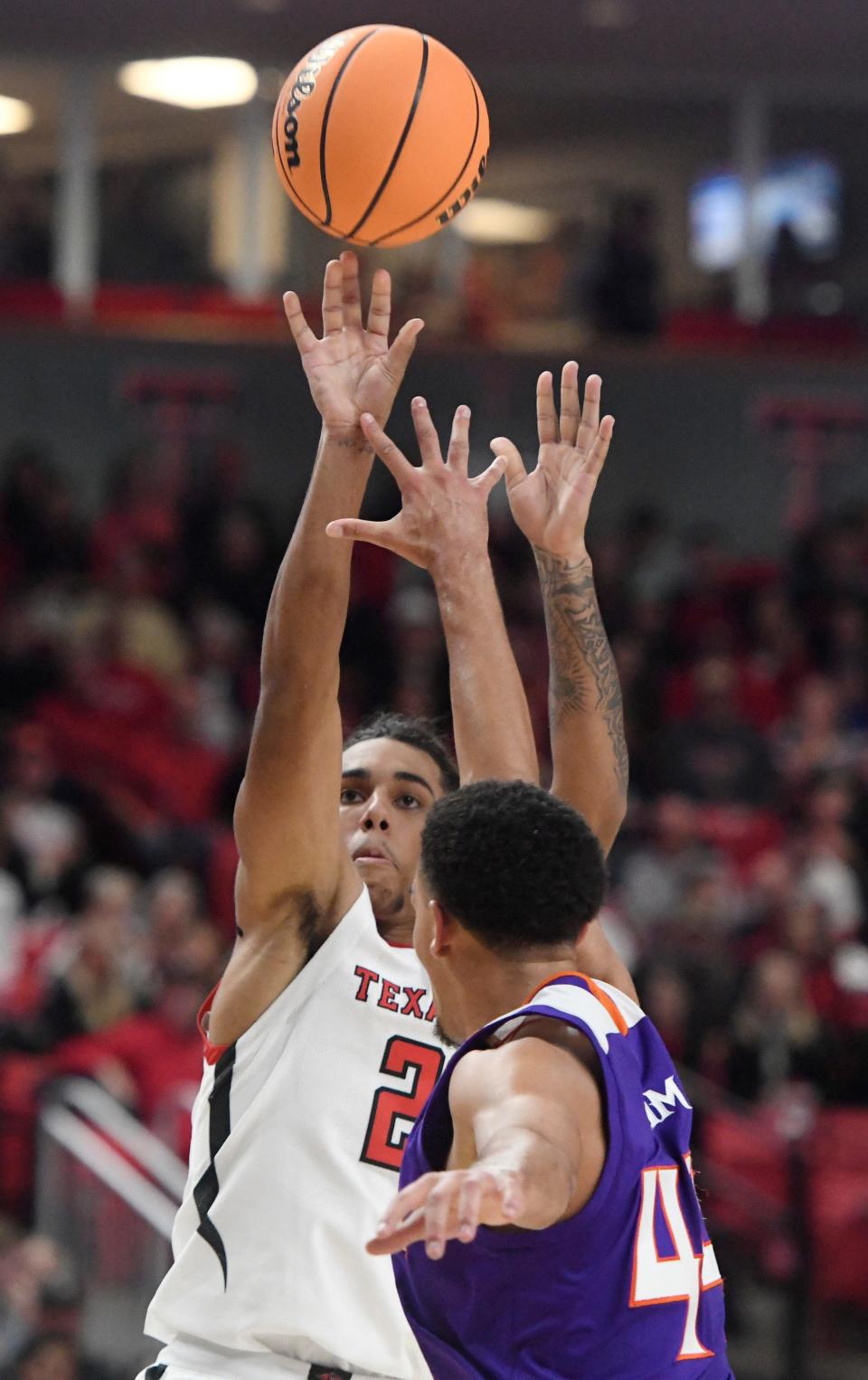 Texas Tech's guard Jaylon Tyson (20) shoots the ball against Northwestern State in a basketball game, Monday, Nov. 7, 2022, at United Supermarkets Arena. 