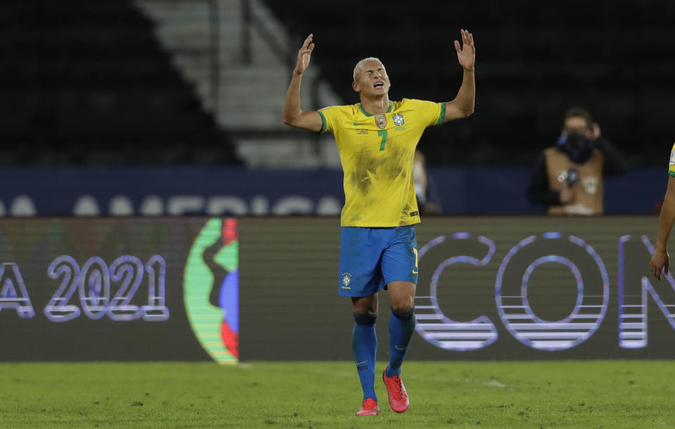 Brazil's Richarlison celebrates after scoring his side's 4th goal during a Copa America soccer match against Peru at Nilton Santos stadium in Rio de Janeiro, Brazil, Thursday, June 17, 2021. (AP Photo/Silvia Izquierdo)