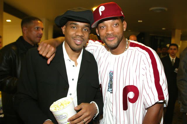 <p>Kevin Winter/Getty Images</p> Duane Martin and Will Smith