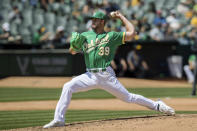 Oakland Athletics starting pitcher Kyle Muller throws against a Cincinnati Reds batter during the fifth inning of a baseball game in Oakland, Calif., Saturday, April 29, 2023. (AP Photo/John Hefti)