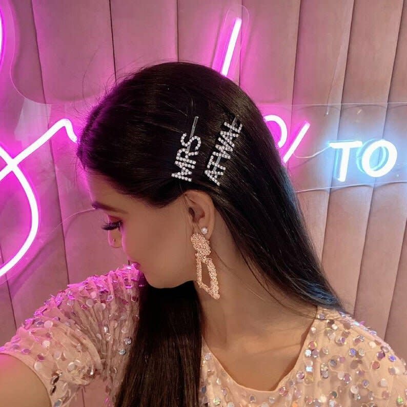 So people recognize your friend even with their bangs pulled back.&nbsp; &lt;br&gt;&lt;br&gt; <strong><a href="https://www.etsy.com/listing/705845779/personalized-crystal-hair-clipcustom?ga_order=most_relevant&amp;ga_search_type=all&amp;ga_view_type=gallery&amp;ga_search_query=custom+hair+clips&amp;ref=sr_gallery-1-1&amp;organic_search_click=1&amp;pro=1" target="_blank" rel="noopener noreferrer">Get the Neobling Personalized Crystal Hair Clips from Etsy for $4.13-$13.93 each.</a></strong>