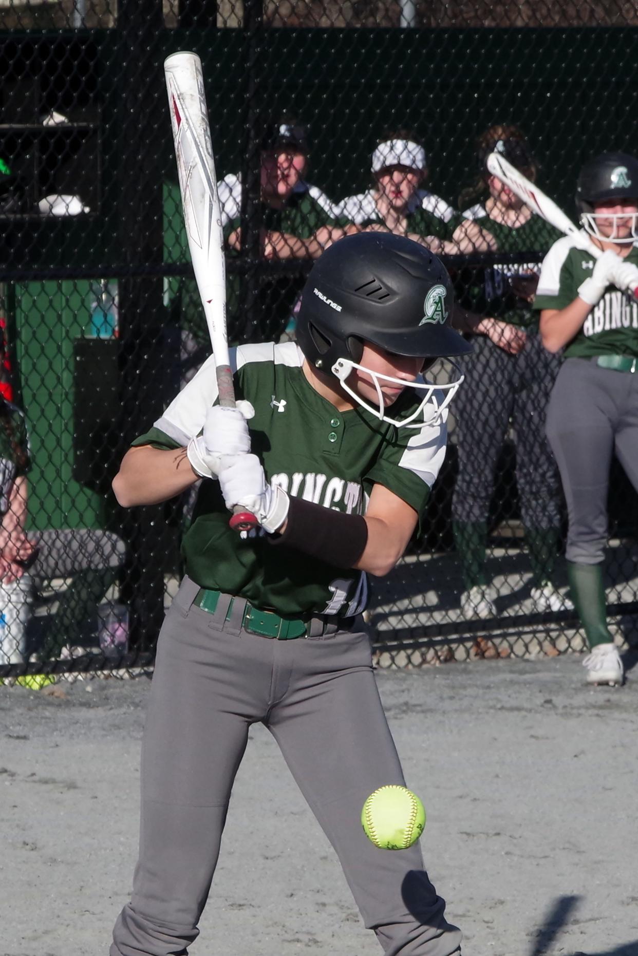 Abington's Brenna Howley gets hit by a pitch in the middle portion of the game and took her base against Carver on Tuesday, April 9, 2024.