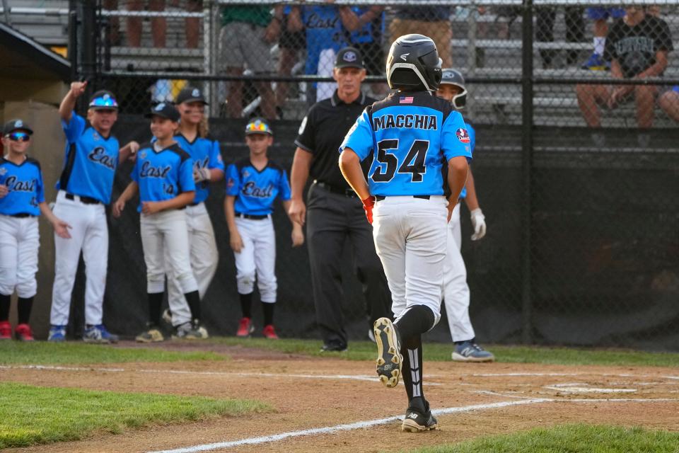 Aug 10, 2022; Bristol, CT, USA; Toms River East pitcher Logan Macchia (54) rounds the bases after hitting a two-run home run against Connecticut during the first inning at Bartlett Giamatti Little League Leadership Training Center. Mandatory Credit: Gregory Fisher-USA TODAY Sports