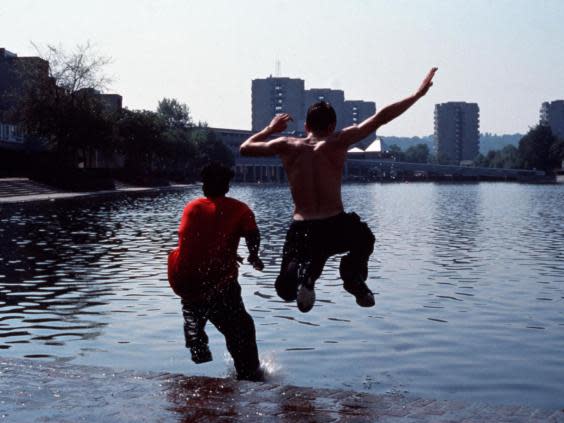 Ste and Jamie jump into the river in Hettie Macdonald’s Beautiful Thing. (Rex)