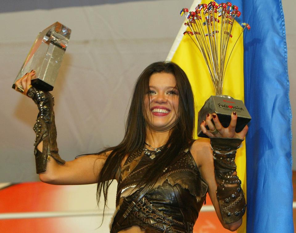 Ruslana shows off her trophy after winning Eurovision on 15 May 2004 at the Abdi Ipekci Stadium, in Istanbul (Getty)