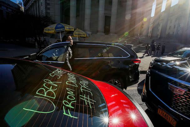 PHOTO: A driver with the ride-sharing company Uber shouts slogans against the company as they take part in a protest against a lawsuit which aims to block pay raises ordered by New York City Taxi and Limousine Commission in New York City, Dec. 19, 2022. (Eduardo Munoz/Reuters)