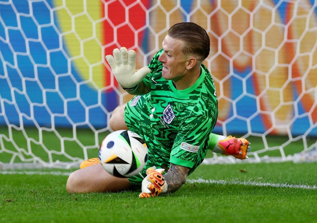 Soccer Football - Euro 2024 - Quarter Final - England v Switzerland - Dusseldorf Arena, Dusseldorf, Germany - July 6, 2024 England's Jordan Pickford saves a penalty in the shootout missed by Switzerland's Manuel Akanji REUTERS/Lee Smith     TPX IMAGES OF THE DAY