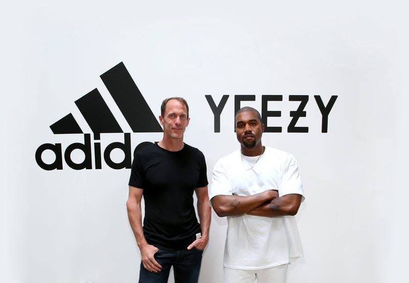 Kanye West with Adidas CMO Eric Liedtke in 2016.