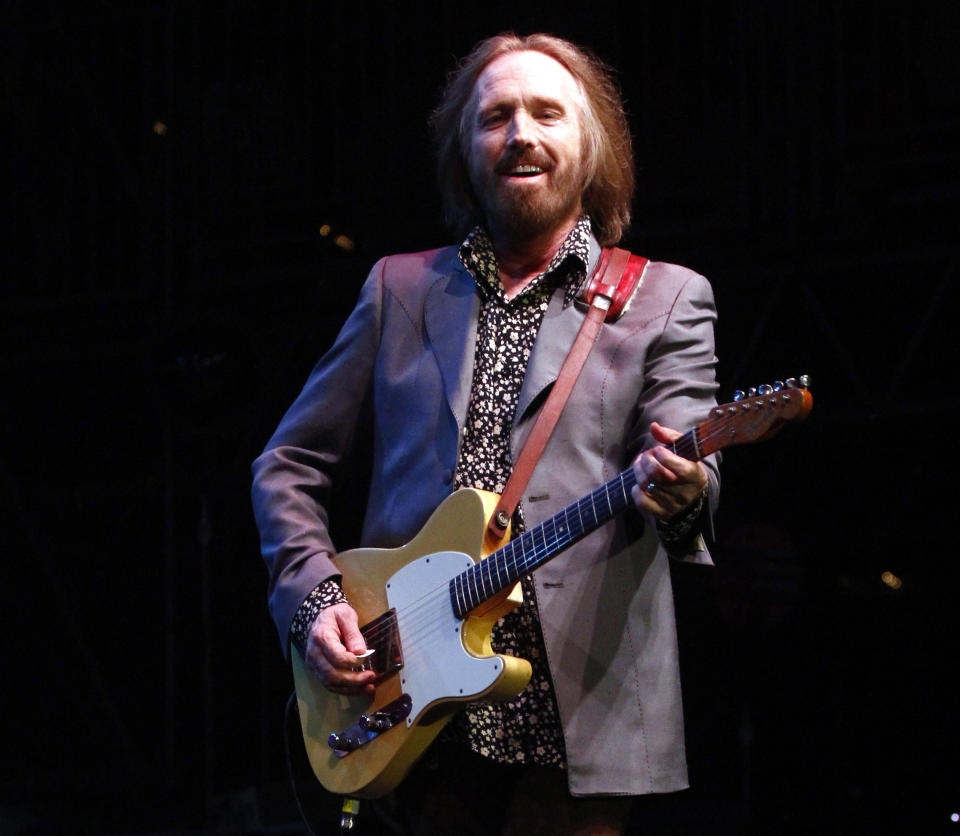 FILE - In this June 16, 2013 file photo, Tom Petty performs on Day 4 of the 2013 Bonnaroo Music and Arts Festival in Manchester, Tenn. Songwriting has gotten harder, not easier, with time, says Petty, who will receive top honors from the American Society of Composers, Authors and Publishers on Wednesday, April 23, 2014, for his four decades in music. (Photo by Wade Payne/Invision/AP, file)