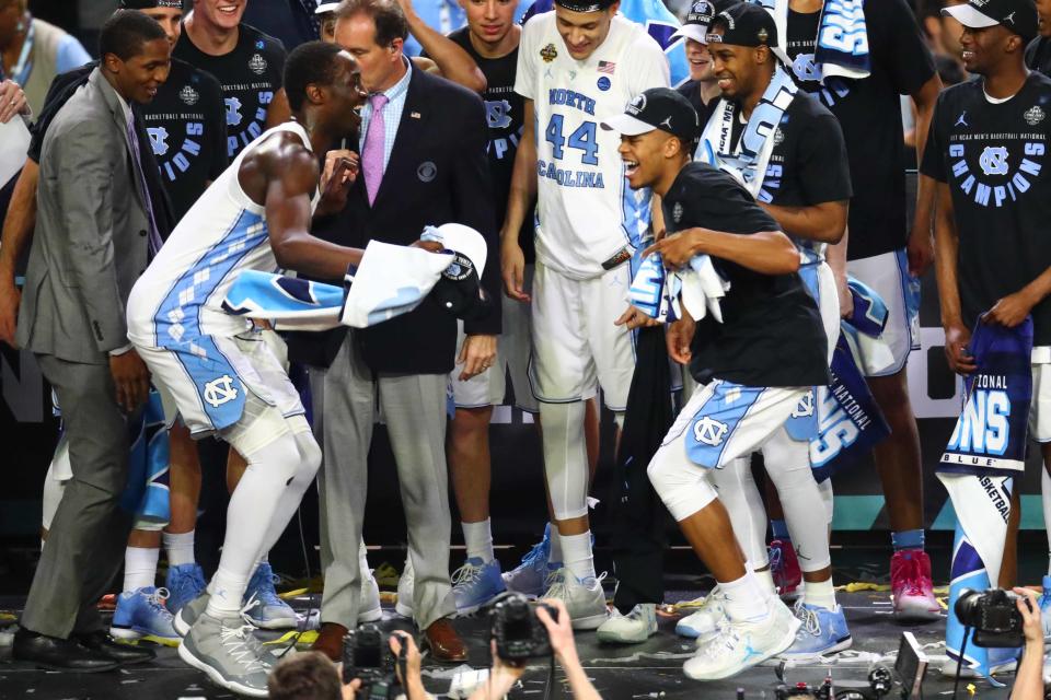 <p>North Carolina Tar Heels forward Theo Pinson (1) dances with teammates after the win over Gonzaga Bulldogs in the championship game of the 2017 NCAA Men’s Final Four at University of Phoenix Stadium. Mandatory Credit: Mark J. Rebilas-USA TODAY Sports </p>