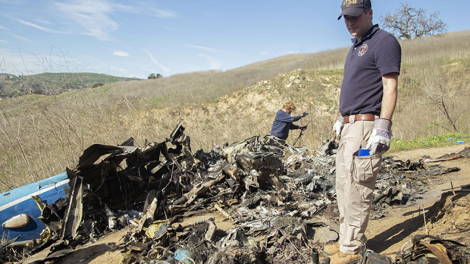 Investigators, pictured here working at the scene of the helicopter crash that killed Kobe and Gianna Bryant.