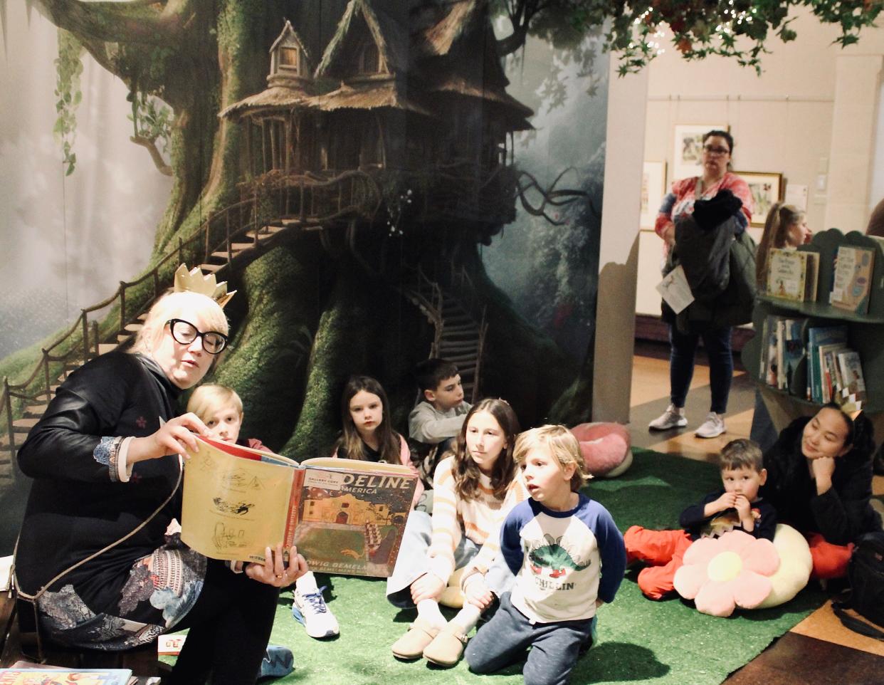 Executive Director Sarah Hall reads to children under a “treehouse” during “Childhood Favorites: 100 Years of Children’s Book Illustration.” Museums no longer host stuffy exhibitions meant for a certain demographic; now they are interactive and thought-provoking.