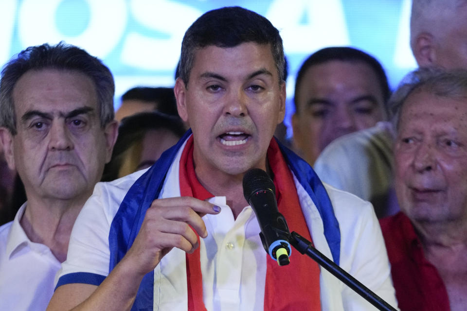 Santiago Peña, presidential candidate of the Colorado ruling party, talks after the voting closed during general elections in Asuncion, Paraguay, Sunday, April 30, 2023. (AP Photo/Jorge Saenz)