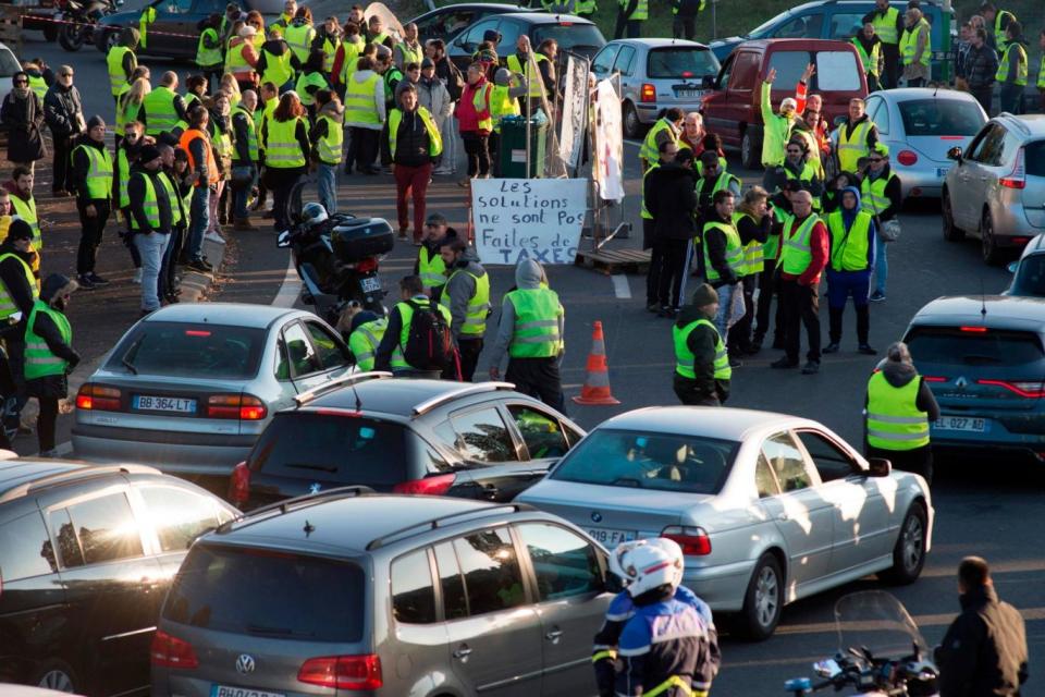 Protesters slow down traffic on a road in Saint-Herblain, near Nantes (AFP/Getty Images)