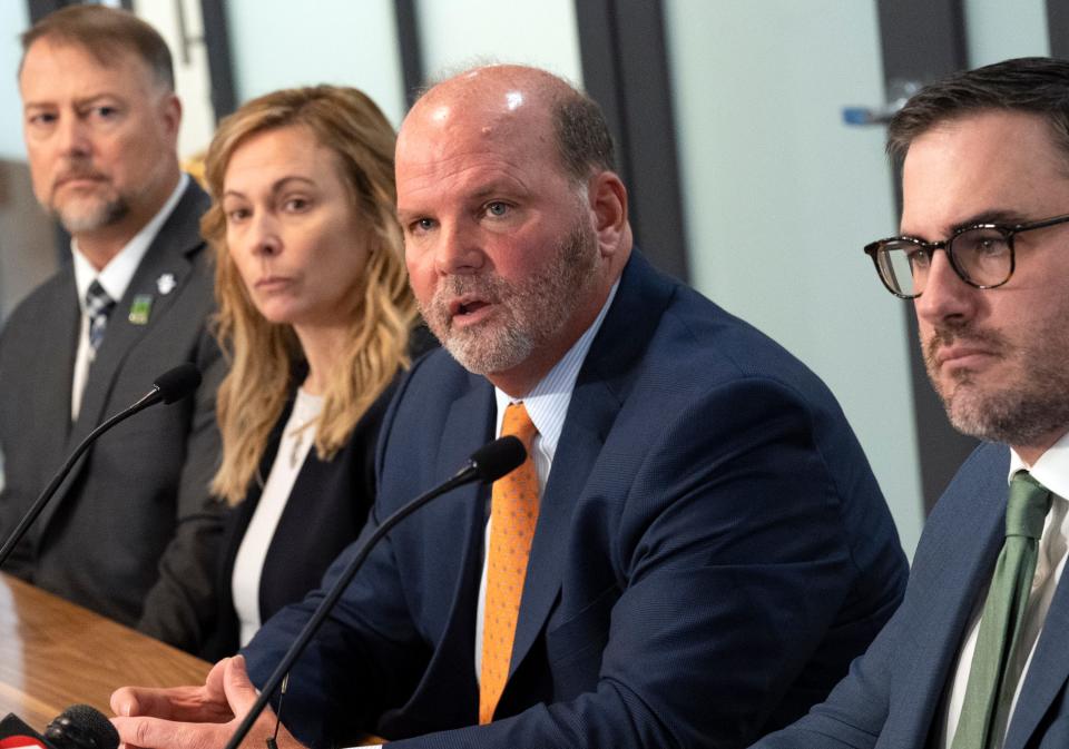 Jan 23, 2023; Columbus, OH, USA;  Attorney Rex Elliott takes questions while sitting with Shari and Cory Foltz and Attorney Sean Alto during a press conference at the Cooper Elliott Law Offices. The Foltz family has received a $2.9 million dollar settlement from Bowling Green University following a lawsuit concerning their son's death in a hazing incident that occurred at the Pi Kappa Alpha fraternity.  Mandatory Credit: Brooke LaValley/Columbus Dispatch