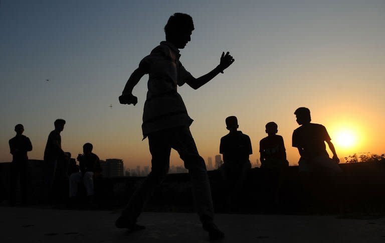 SlumGods members take part in a dance practice at the Sion fort in Mumbai on November 30, 2012. SlumGods now has 40 to 50 core members across the cities of Mumbai, New Delhi and Bangalore