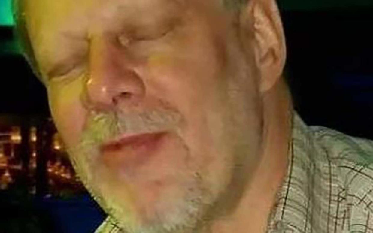 Stephen C Paddock, 64, killed himself before armed police blasted their way into his hotel room - AFP